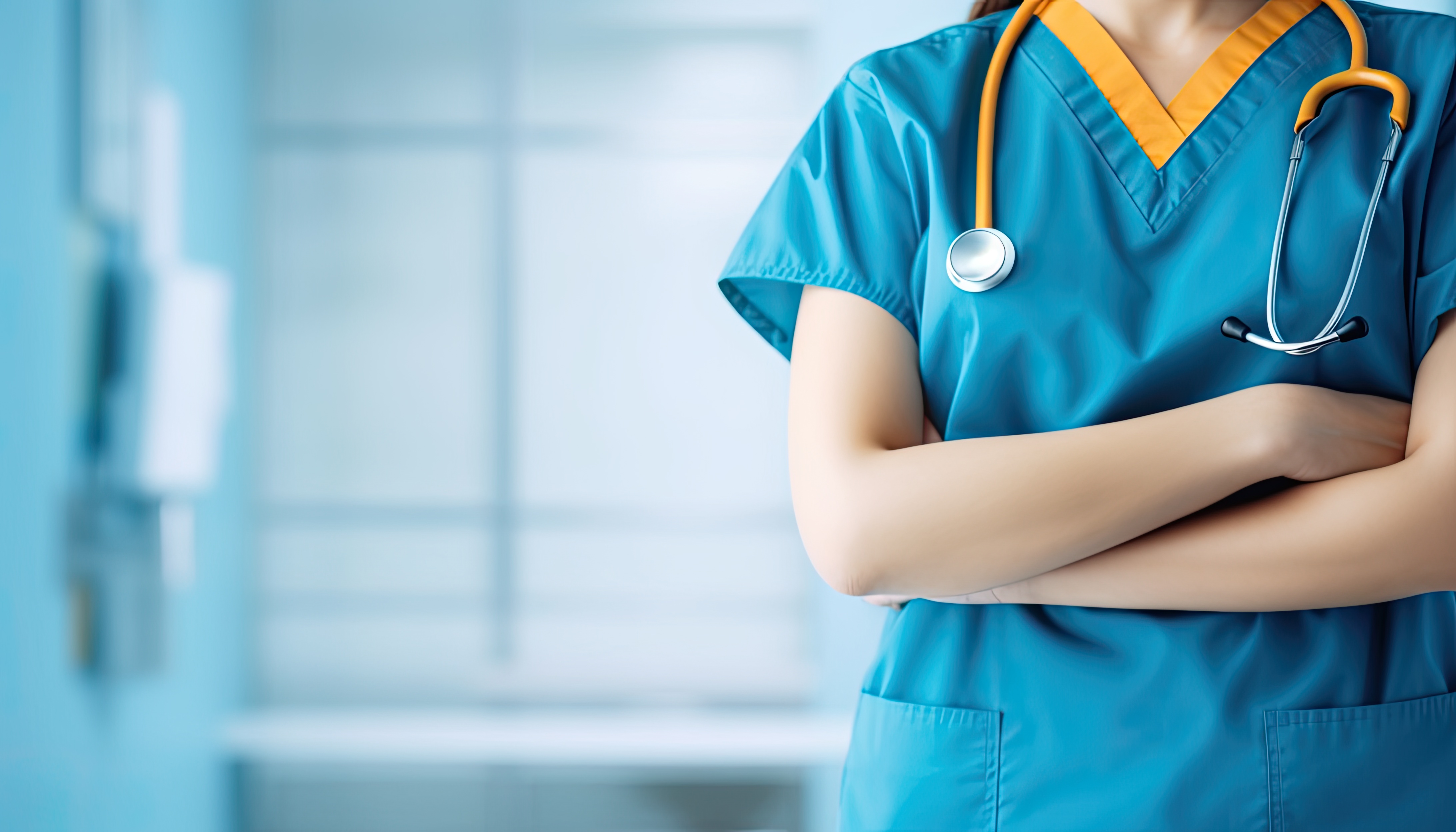 Healthcare professional in scrubs with a stethoscope in a bright clinical setting